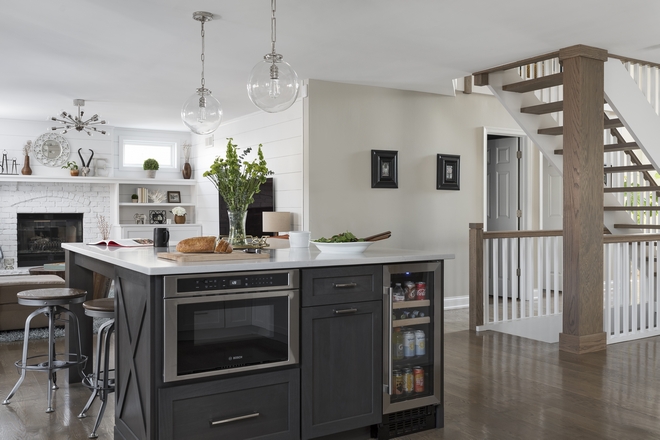 Kitchen Island Pull-out Trash Bin This kitchen island features a microwave drawer beverage center and a pull-out trash and recycling bins