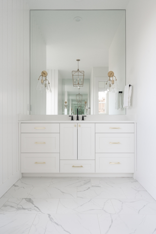 In this bathroom the custom vanities face each other Do you prefer having a long vanity with double sinks or single vanities facing each other