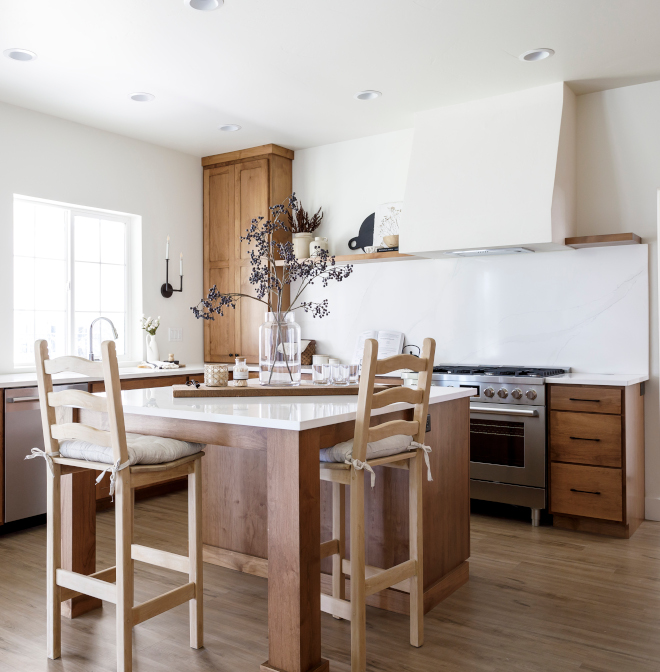 Kitchen island The island provides extra seating while the ample counter space makes it ideal for food prep and serving #kitchenisland