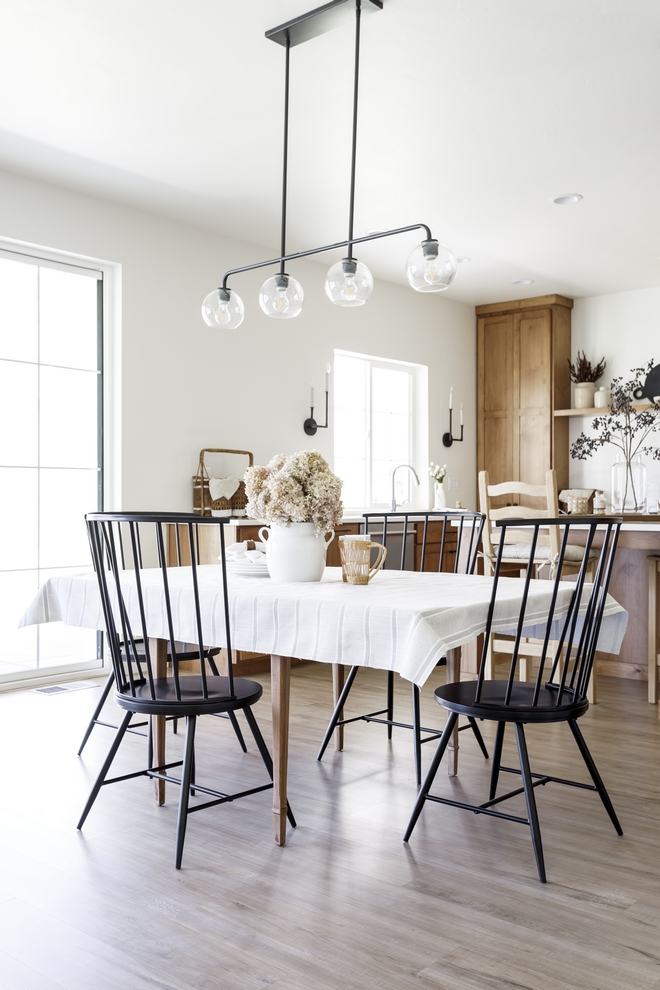 With an open concept perfect for entertaining or everyday living the dining space is directly between the kitchen and the great room for ease of movement between the spaces #diningroom