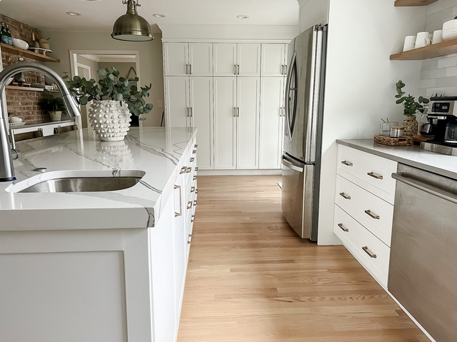 Kitchen Renovation The island is my favorite part of the kitchen It s massive size and beautiful countertop make it the focal point of the room We went with a mitered edge on the countertop to give it that thicker more luxurious vibe #kitchenrenovation #kitchenisland