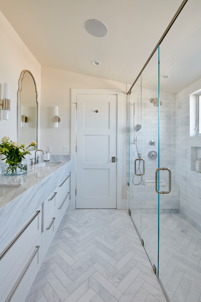 A curbless shower along with timeless elements makes this bathroom feel larger and seamless Bathroom design #bathroom #curblessshower #classic #clasicbathroom