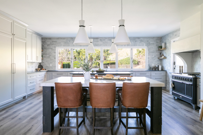 Kitchen Addition With the new addition the designers were able to design an expansive kitchen with double kitchen islands and plenty of cabinetry