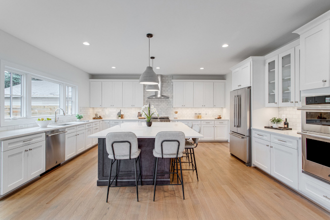 Kitchen design Adding glass cabinets helps break up all the solid wood cabinetry as well as serve as an accent to display your favorite kitchenware #kitchendesign #kitchen #cabinet #glasscabinet