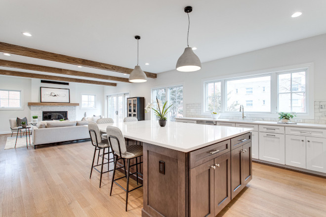 We really like the pop of color in the island to balance out the bright white kitchen