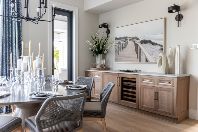 Built-in sideboard Cabinetry is by Brakur Custom Cabinetry White Oak in Forest stain