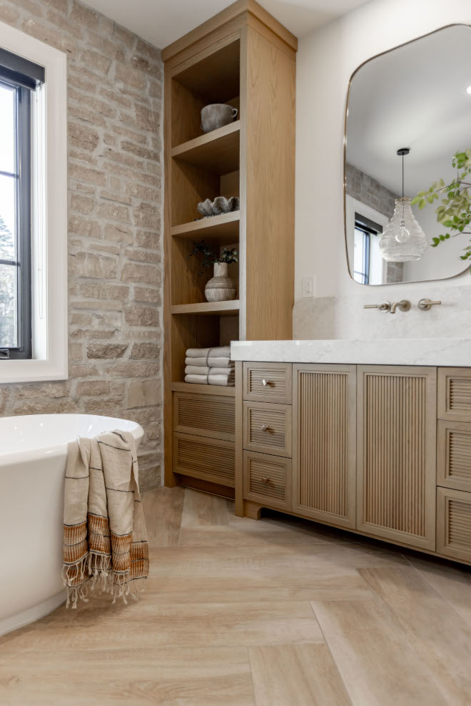 Bathroom vanity vanity produces some character of its own with a mix of vertical and horizontal fluted millwork #bathroom #vanity #cabinet #flutedcabinet #millwork