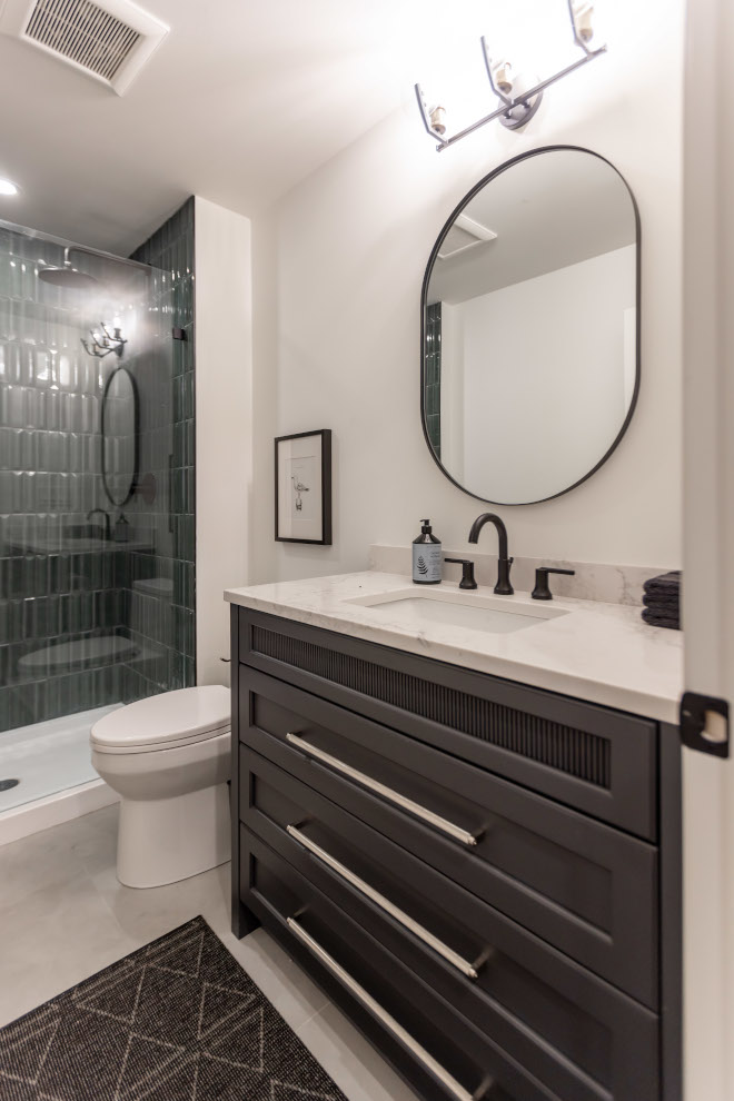 Custom vanity consists entirely of drawers to maximize storage We used oversized 18 inch pulls to elongate the look of the vanity and to make it feel more like a piece of furniture #vanity #bathroom