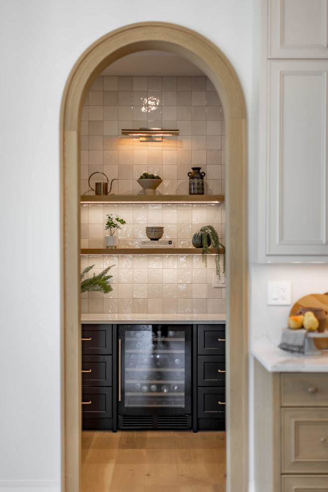 Pantry with Arched Doorway We opted to eliminate all doors in the main floor kitchen area which meant that every space had to have visual appeal #Pantry #ArchedDoorway #kitchen #visualappeal
