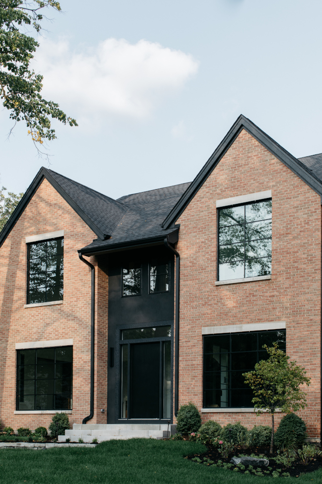 This home features a stunning combination of black accents with the classic brick exterior #brick #exterior #blackexterior