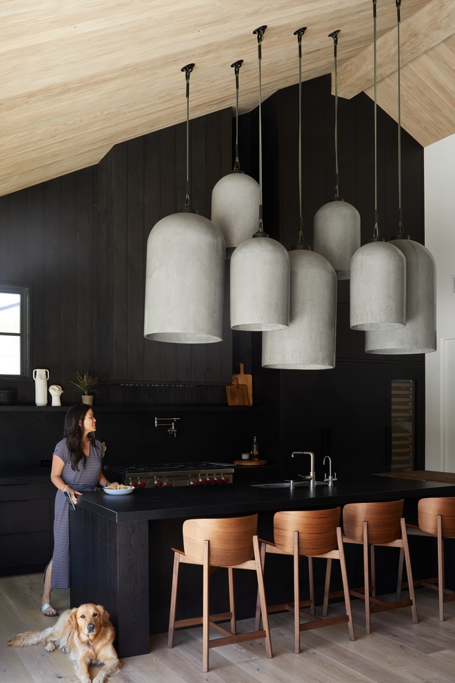 Unique Lighting Custom concrete pendants over kitchen island They are 100 per cent polished concrete The concrete pendants are suspended with climbing rope in the kitchen ceiling #UniqueLighting #Lighting #concretependant