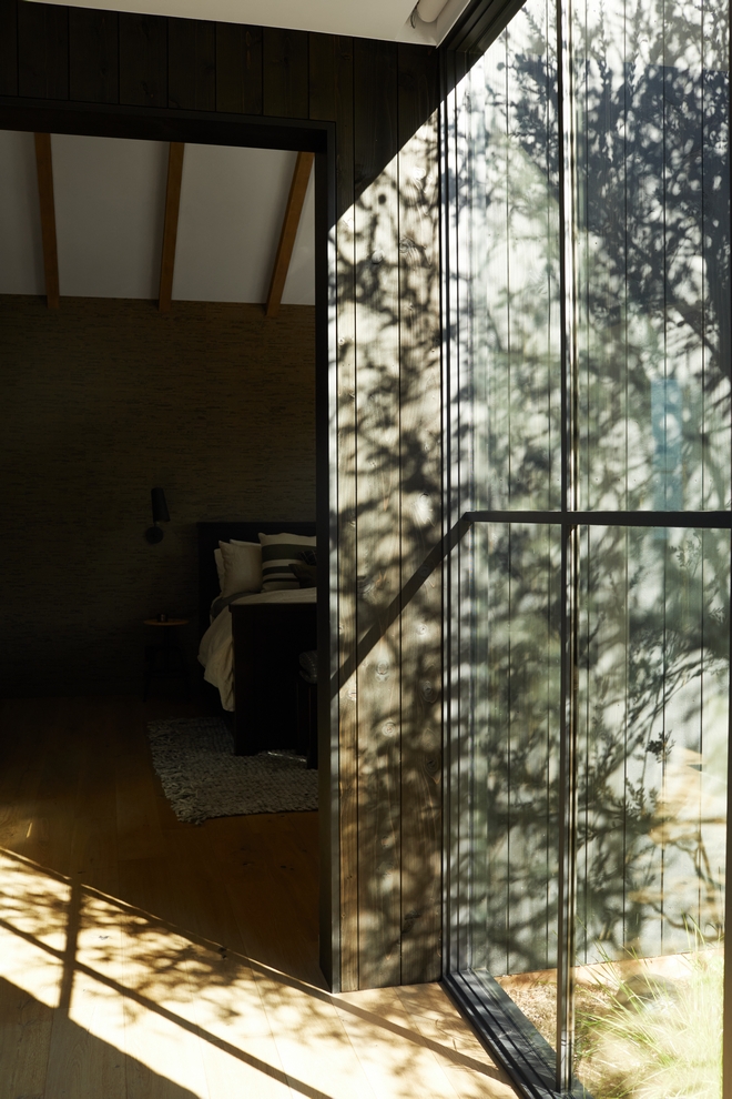 Hall with windows instead of walls The architect created a connection to the outdoors by installing windows instead of wall leading into the Primary Bedroom #hall #windows