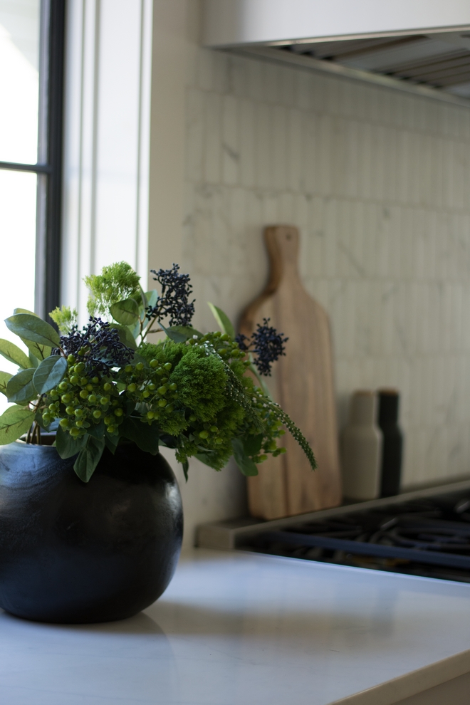 A vase of fresh flowers or faux stems is the easiest way to style any space including a kitchen #vase #flowers #fauxstems #kitchendecor #homedecor