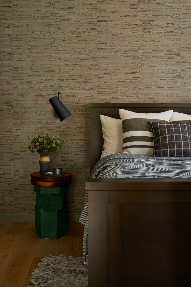 This entire space feels intimate and warm Wallcovering is actually recycled newspapers turned into wallpaper