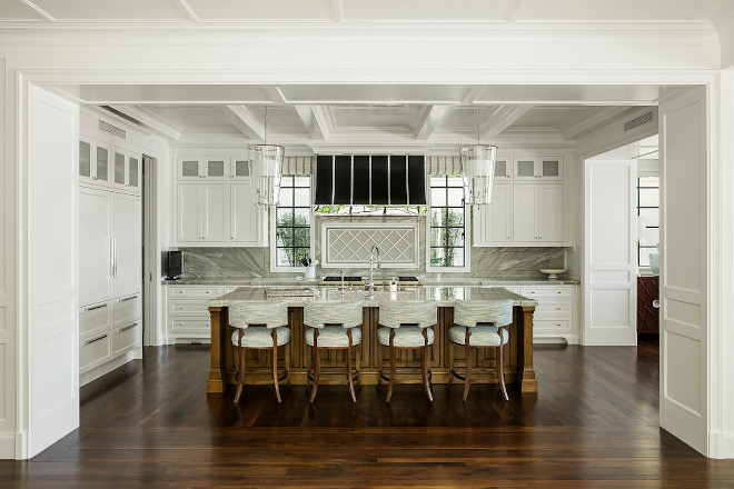 Classic White Kitchen In the kitchen custom white cabinets and coffered ceiling complement the classic dark stained hardwood floors Classic White Kitchen In the kitchen custom white cabinets and coffered ceiling complement the classic dark stained hardwood floors #Classic #WhiteKitchen #kitchen #customwhitecabinet #cofferedceiling #darkstainedhardwoodfloors