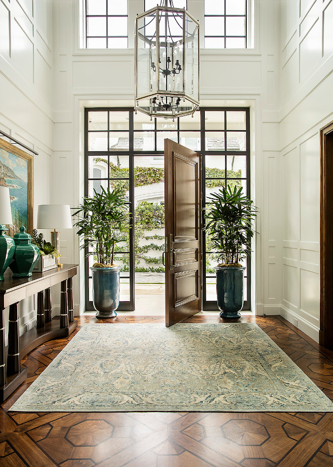 Foyer American black walnut hardwood floors done with a mosaic inlay pattern using African wenge wood in the foyer Foyer American black walnut hardwood floors done with a mosaic inlay pattern using African wenge wood in the foyer #Foyer #Americanblackwalnut #hardwoodfloors #walnuthardwoodfloor #mosaicinlay #mosaicinlaypattern #Africanwengewood #foyerdesign