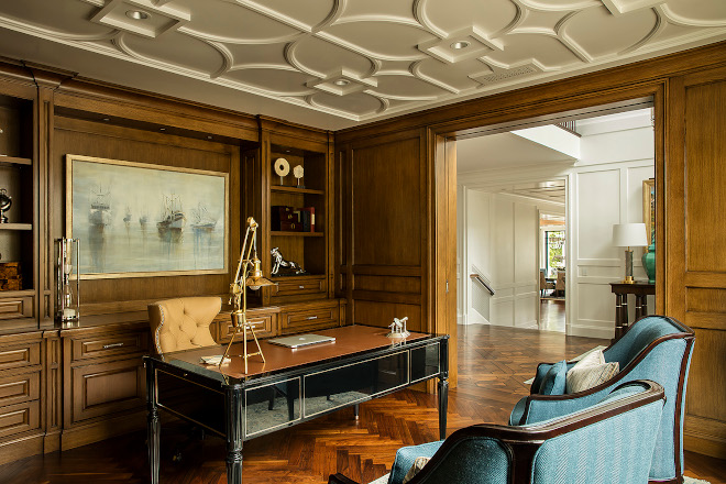 Office wall paneling This stunning Home Office features Oak wall paneling custom cabinets and Herringbone Walnut hardwood flooring #Office #homeoffice #wallpaneling #Oak #paneling #customcabinets #herringboneflooring #Walnutflooring #hardwoodflooring