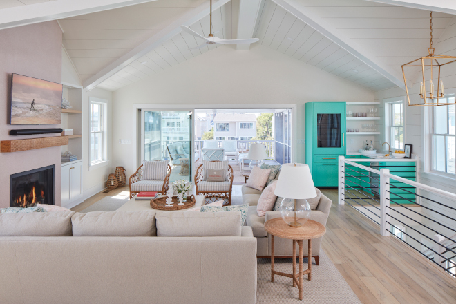 The clear line-of-sight on this level leads to the screened porch overlooking the seaside setting