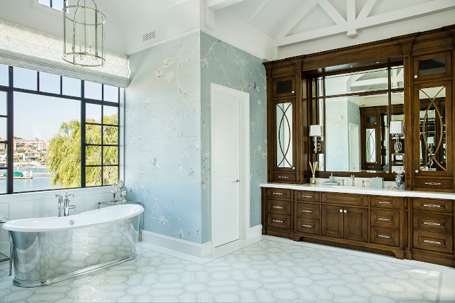 The master bathroom ceilings are vaulted in various locations with exposed trusses overhead and two 12-foot master vanities were custom-built on-site #masterbathroom #bathroom #ceilings #vaultedceiling #exposedtrusses #vanities
