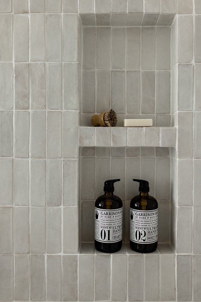 Using the same tile or stone in the shower niche creates a seamless feel that I tend to prefer