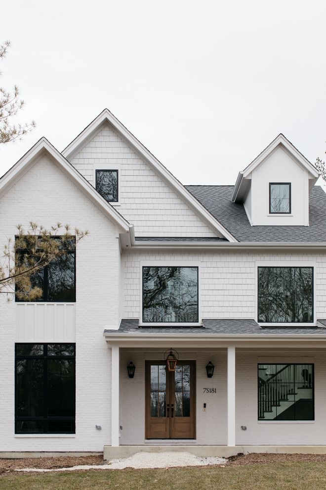 Front Door Stained Red Oak Double Doors each Glass with single cross pane Shaker panel at bottom jamb black hinges and threshold #FrontDoor #Staineddoor #RedOak #DoubleDoors #crosspane #Shaker panel at bottom jamb black hinges and threshold