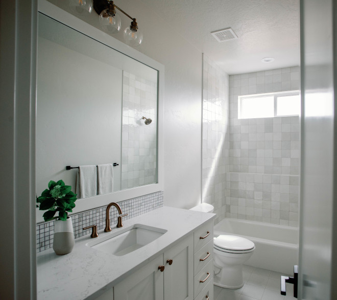 A neutral bathroom is always a safe and calming choice Cabinets are Sherwin Williams Alabaster