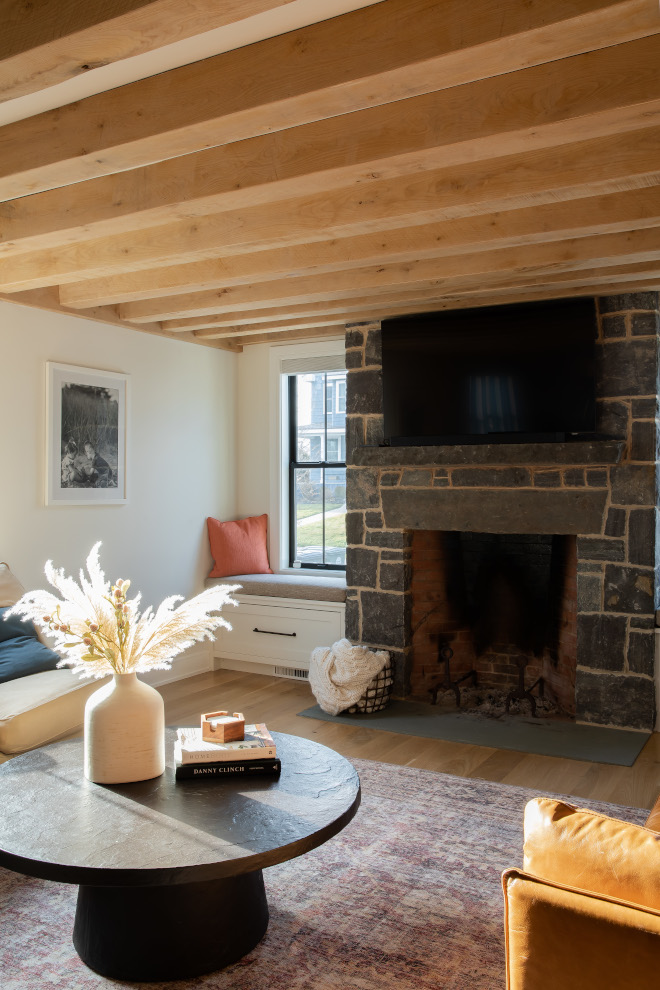 Beams Exposed ceiling beams and a stone fireplace give a European flair to this seaside home Beams Exposed ceiling beams and a stone fireplace give a European flair to this seaside home Beams Exposed ceiling beams and a stone fireplace give a European flair to this seaside home #Beams #Exposedbeams #ceilingbeams #stonefireplace #European #seaside #home