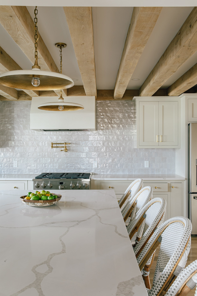 Kitchen backsplash tile and marble quartz countertop combination is perfect with neutral warm white cabinets Kitchen backsplash tile and marble quartz countertop combination is perfect with neutral warm white cabinets #Kitchen #backsplash #tile #marble #quartz #countertop #combination #neutral #warmwhite #neutralcabinets