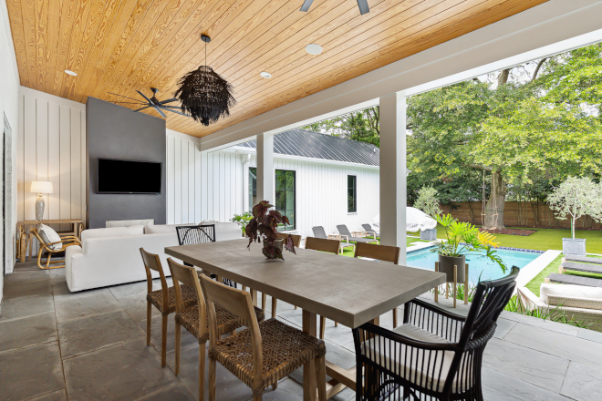 A large back porch is perfect to enjoy the warm weather you often get in Charleston