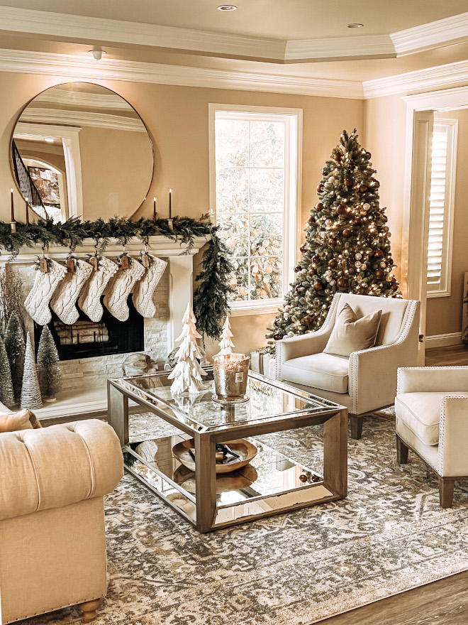 Neutral Christmas decor The living room is one of the first rooms you see when you enter the front door so the homeowner added plenty of neutral Christmas decor #neutralChristmasdecor #Christmasdecor