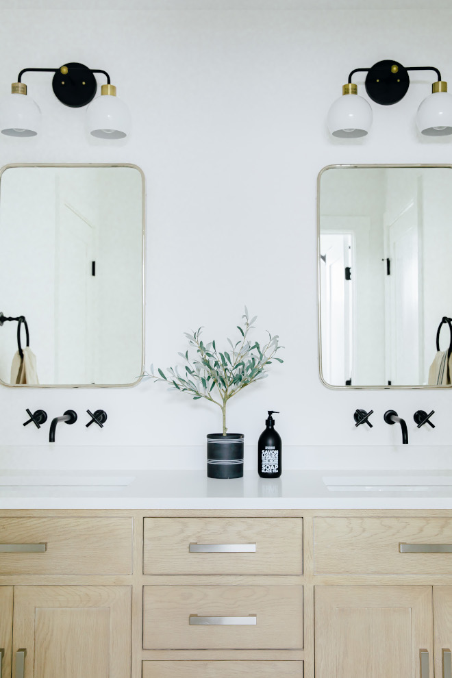 Bathroom features a pair of Rounded Rectangle Metal Framed Mirrors Bathroom features a pair of Rounded Rectangle Metal Framed Mirrors #Bathroom #RoundedRectangleMetalFramedMirrors