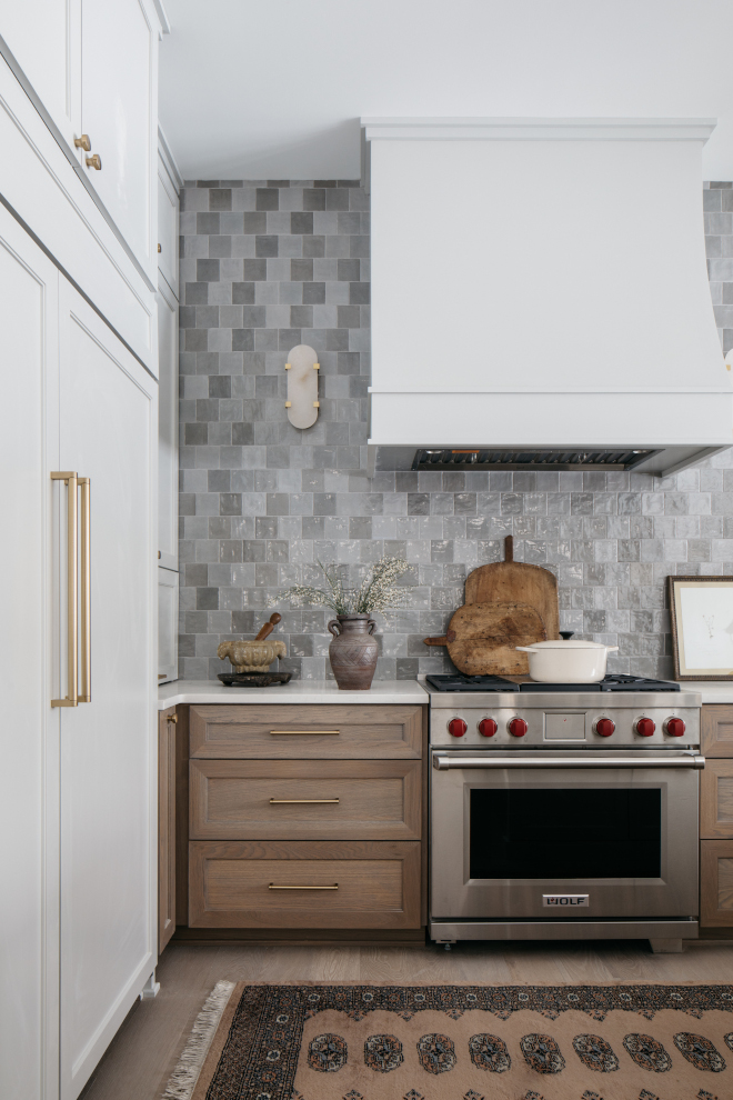 Gray Zellige Accent Backsplash Tile paired with a curved range hood and white oak cabinets Gray Zellige Accent Backsplash Tile paired with a curved range hood and white oak cabinets #GrayZelligetile #AccentBacksplashTile #tilepairedcurvedhood #curvedrangehood #whiteoakacabinet