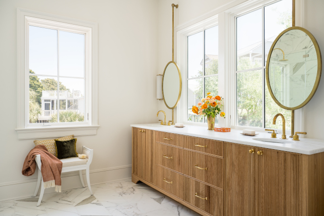 Reeded White Oak cabinetry are on the rise with homeowners and this bathroom certainly has a design that will endure the test of time #ReededWhiteOak #cabinetry #homeowners #bathroom #design