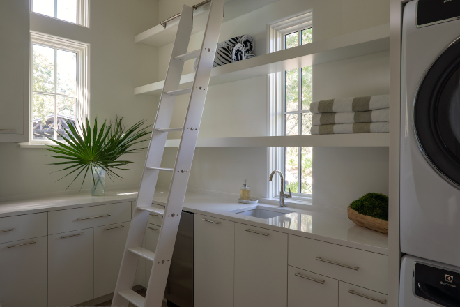 A removable ladder is as functional as it is a charming addition to this laundry room #laundryroom