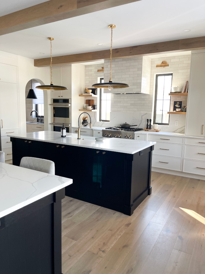 White kitchen with double black island painted in Sherwin Williams Black Magic White kitchen with double black island painted in Sherwin Williams Black Magic #Whitekitchen #doubleisland #blackisland #SherwinWilliamsBlackMagic