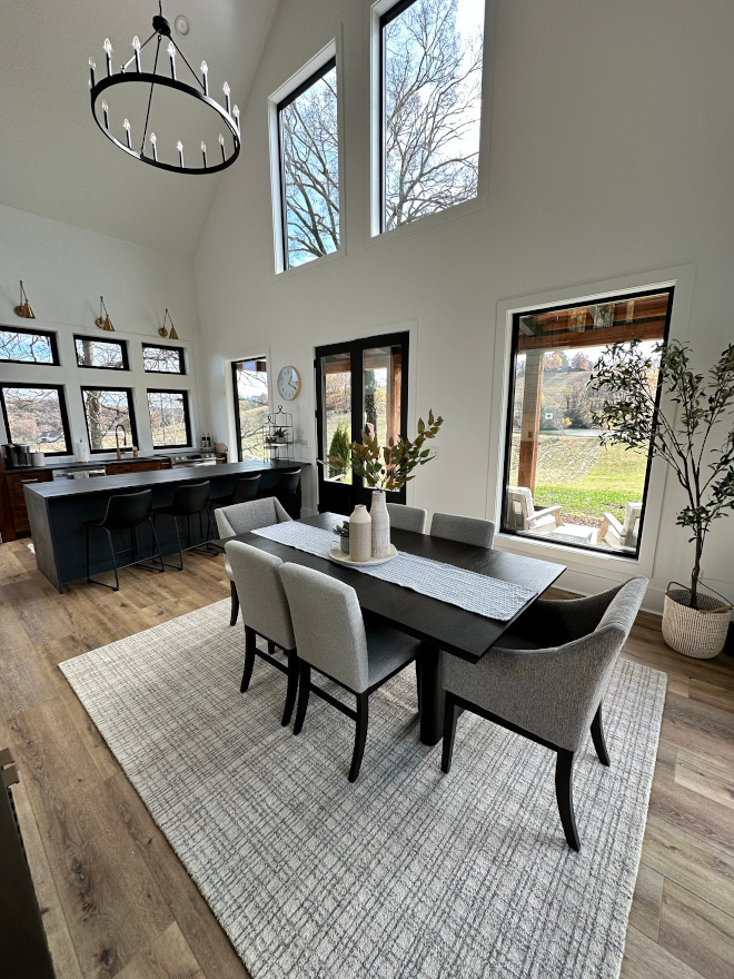 We love the open flow from the kitchen to dining area especially with the vaulted ceiling and floor to ceiling windows #openflow #kitchen #diningarea #vaultedceiling #floortoceilingwindows #windows