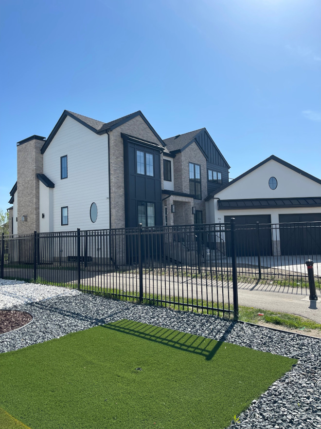 Modern Home Design with black board and batten siding and pitched roof lines #ModernHome #ModernHomeDesign #blackboardandbattensiding #pitchedrooflines