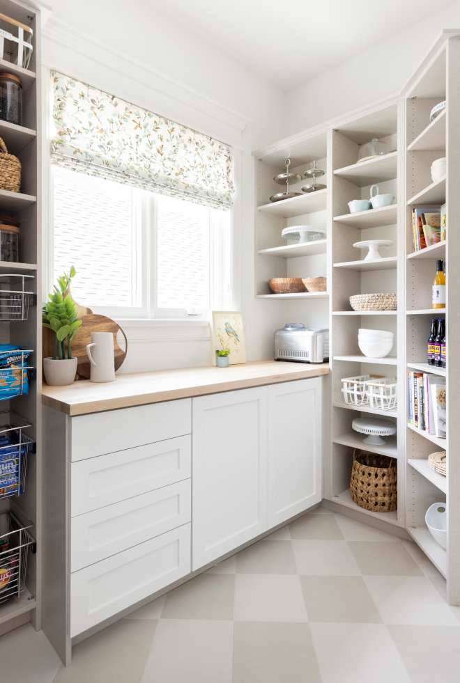 Pantry Cabinet A cabinet with butcher block countertop offers plenty of storage and a flat surface for food organization and baking #Pantry #Cabinet #Pantrycabinet #butcherblock #countertop #storage #foodorganization #baking