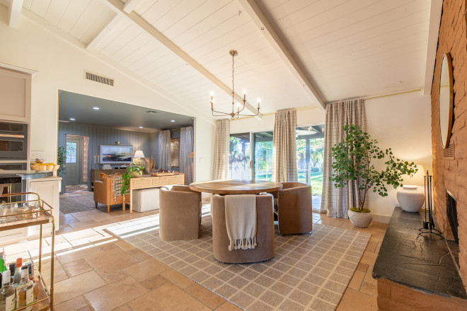 The kitchen and dining area feature wood-beamed ceilings in Benjamin Moore OC-45 Swiss Coffee The kitchen and dining area feature wood-beamed ceilings in Benjamin Moore OC-45 Swiss Coffee #kitchen #diningarea #woodbeamedceilings #BenjaminMoore #BenjaminMooreOC45 #BenjaminMooreSwissCoffee