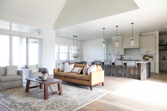 Open layout The large sliding glass doors provides easy access from the great room to the show stopping front patio anchored by an outdoor fireplace #Openlayout #slidingglassdoors #greatroom #patio #outdoor #fireplace