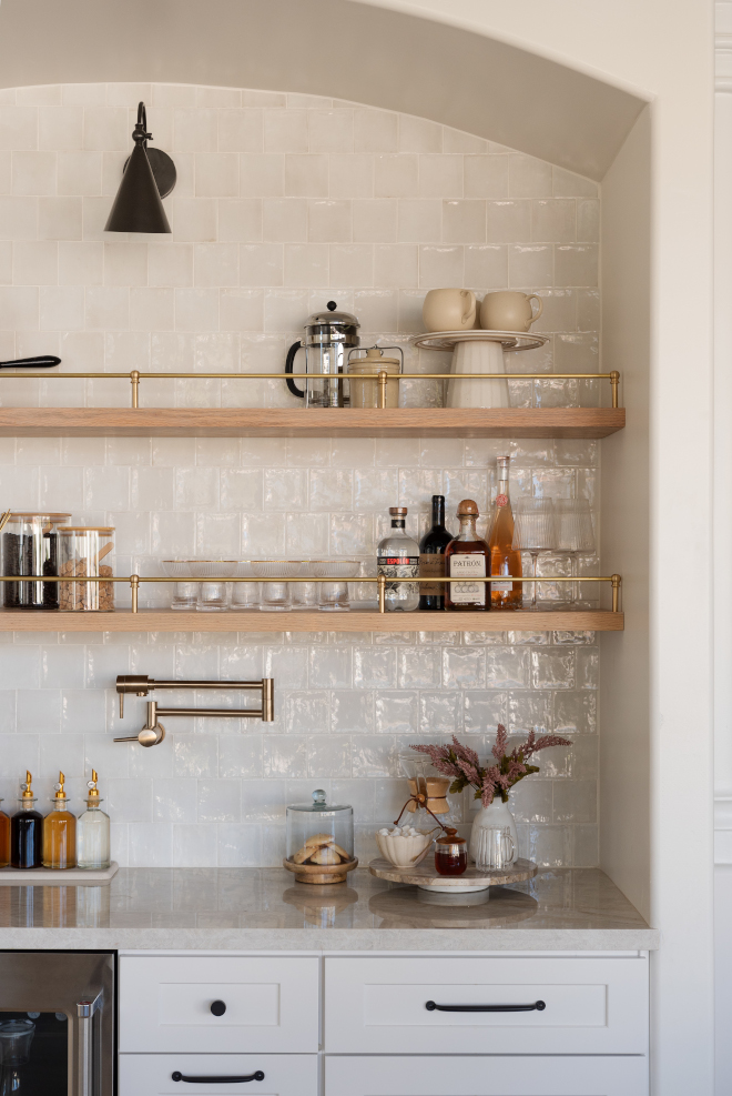 We also carried over the Taj Mahal quartzite countertops to this area and the inexpensive porcelain backsplash tile for some cost savings #bar #TajMahalquartzite #countertop