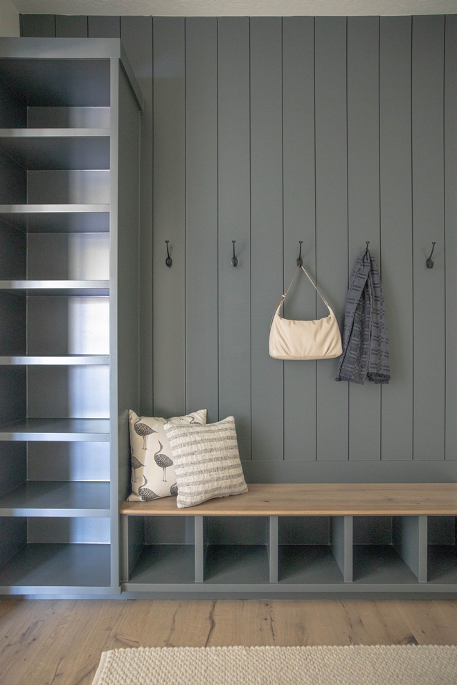 Mudroom Bench seat is made out of hardwood floor planks