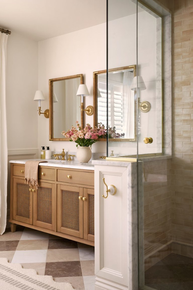 Earth-Tone Bathroom Inspiration Photo Earthy bathroom makeover inspiration featuring natural textures, warm neutral tones, organic modern design, natural wood vanity, and earthy home décor ideas. Warm neutral bathroom with layered textures, brass fixtures, and soft stone. Earthy bathroom design inspired by 2026 bathroom trends, perfect for remodel inspiration.