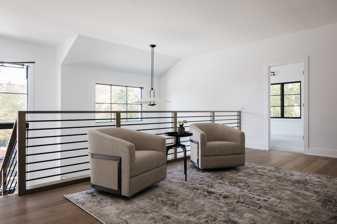 This cozy landing area features swivel chairs soft textures and a peaceful spot to unwind perfect organic modern inspiration for your next build #LandingArea #CozyCorner #ReadingNook #OrganicModernHome #HomeDesignInspo #UpstairsLanding #ModernHomeIdeas #2026HomeTrends This cozy landing area features swivel chairs soft textures and a peaceful spot to unwind perfect organic modern inspiration for your next build #LandingArea #CozyCorner #ReadingNook #OrganicModernHome #HomeDesignInspo #UpstairsLanding #ModernHomeIdeas #2026HomeTrends