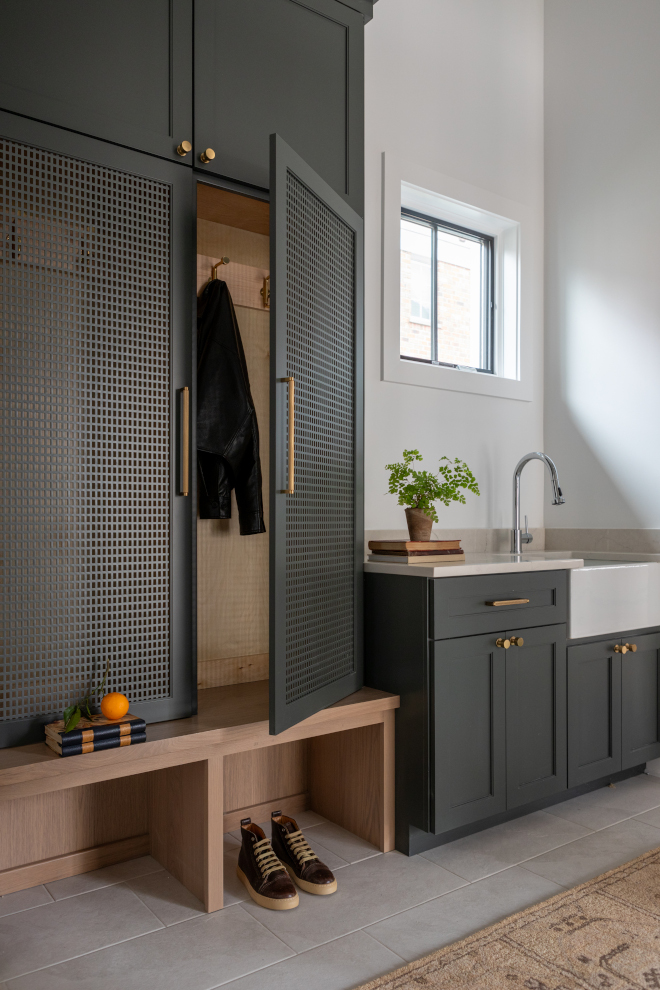 Mudroom cabinets painted Sherwin Williams Rock Bottom with sink, custom storage, and Chantilly Lace walls.