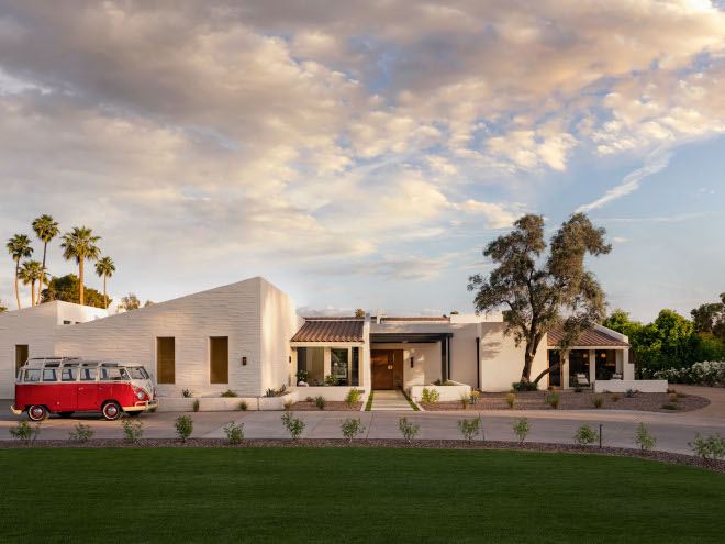 Arizona mid-century modern home exterior painted in Benjamin Moore Soft Chamois OC-13, warm white desert-inspired color highlighting clean architectural lines and natural landscaping.