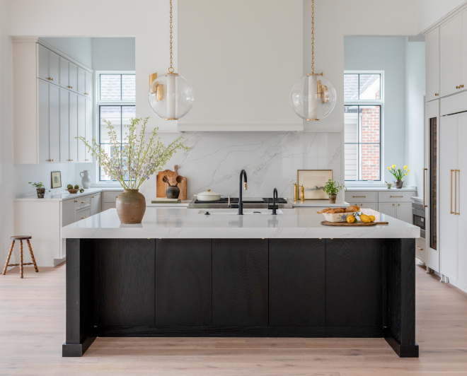 Whole-home paint color ideas for a new construction home in 2026 featuring timeless white walls, greige cabinets, and cohesive neutral finishes.