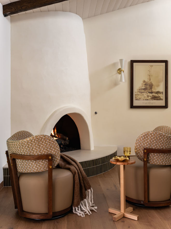 Iconic mid-century modern beehive fireplace with Dunn Edwards Whisper paint highlighting warm neutrals and layered textures.