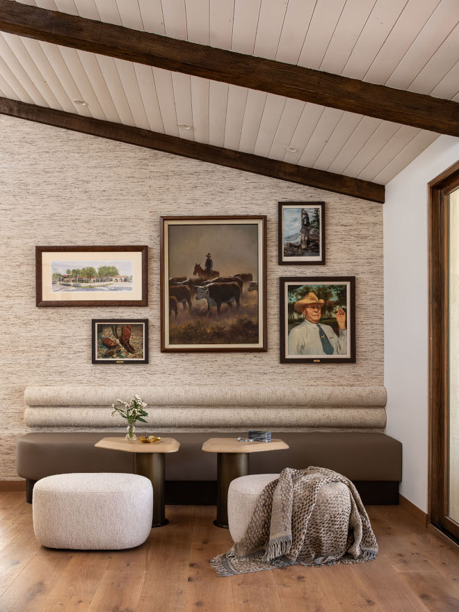 Mid-century modern lounge banquette seating with warm walnut cabinetry, cozy upholstered cushions, and natural textured accents, creating a welcoming and stylish retreat.