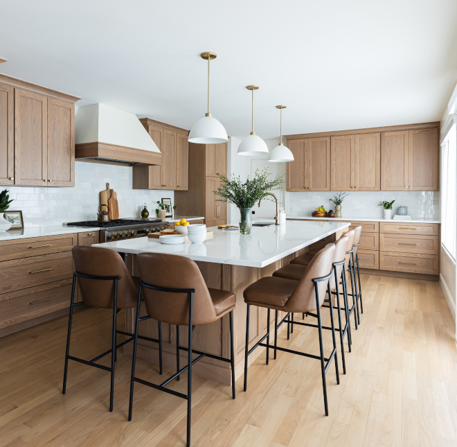 Before-and-After-Kitchen-Remodel-with-White-Oak-Cabinets Before and after kitchen remodel featuring white oak cabinets, expanded island, quartz countertops, and improved layout with added natural light
